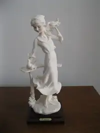 Figurine G. Armani