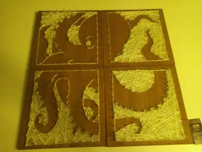 Handmade string art wall piece by a local Alberta artist (K’s Kreations). One-of-a-kind, signed/tagg...