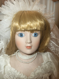 Musical bridal doll in pristine condition.