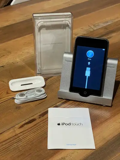 Calling all Apple collectors and retro-tech lovers! Up for grabs is a genuine Apple iPod Touch 8GB,...