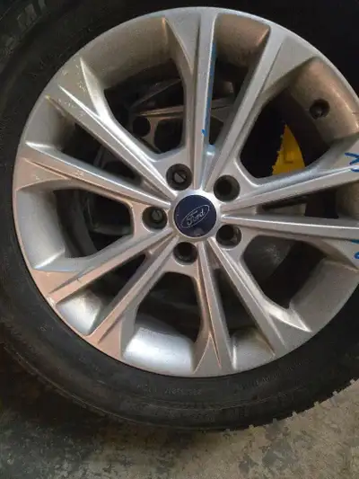 4 Brand New 17 x 7 1/2 Michelin Winter tires on Ford Aluminum Rims. Bought brand new, but never need...