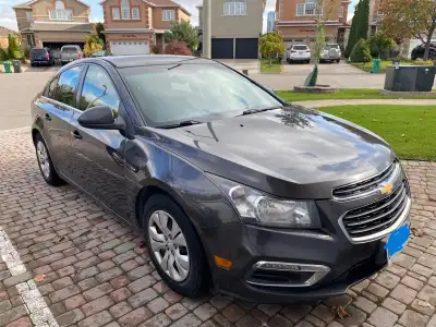 CHEVY CRUZE IN EXCELLENT CONDTION. REASONABLY PRICES AT $4950. AS IS, NO TRADES. SELLING WITH 4 WINT...