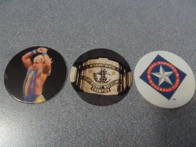 1994+95 Pogs. Lot #138. 3 for $2 cash only. 2 WWF +1 Texas Ranger Baseball. Ex condition, smoke free...