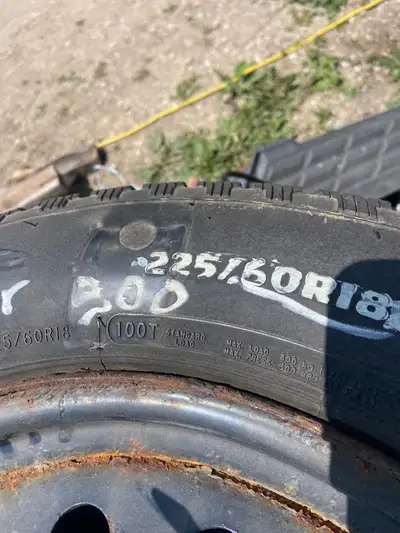 A set of 4 snow tread tires mounted on steel rims off a Chrysler 300 $350.00 for the set If add is u...