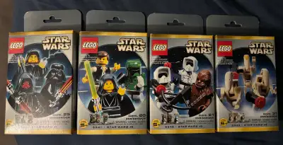 I am selling this rare set of four vintage LEGO Star Wars minifigure packs, including sets 3340, 334...