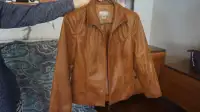 One Vinyl jacket and one leather jacket