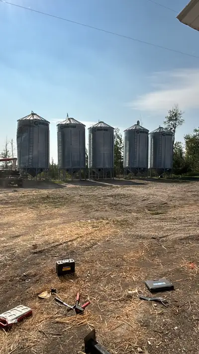 I am selling several used hopper bottom bins, perfect for grain storage. These bins are in good cond...