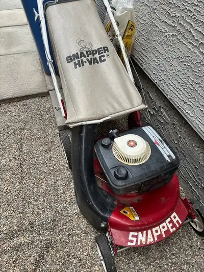 ON HOLD FREE old working lawn mower, View more