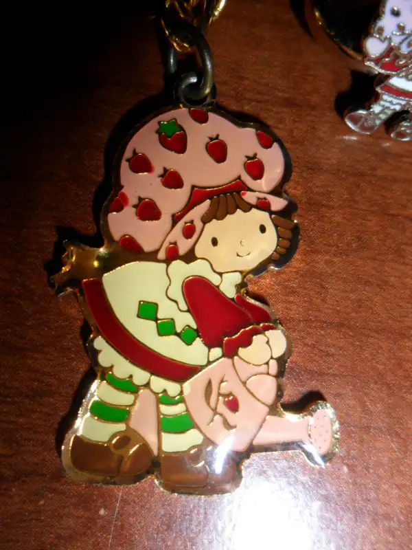Vintage Strawberry Shortcake Ring and Bracelet. $30 for both.  C63735875854337123