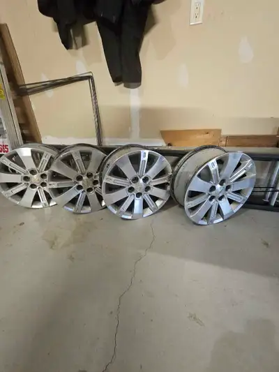 18" Aluminum Rims. Chev 5 Bolt pattern. All 4 have intact tire sensors. Fits 235/55 R18 tires Overal...