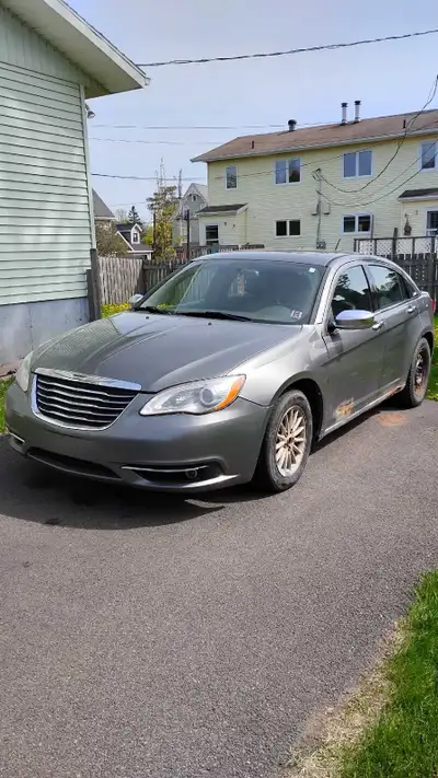 Seeing whats out there for trades. 2013 Chrysler 200. V6 with 250,000km, fully loaded. Needs rocker...