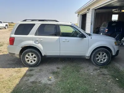 2009 Mazda Trubute. 3.0 litre engine AWD, 5 seater loaded leather sunroof etc, 2 sets of tires come...
