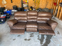 Brown leather reclining couch