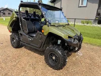 The ultimate work and play side-by-side, Great machine needs nothing, has a winch, windshield, roof...