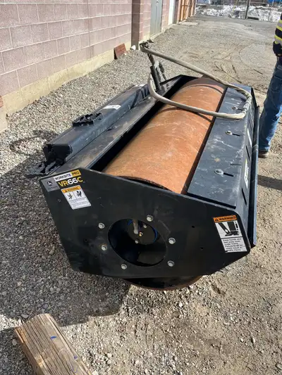 John Deere VR66C skid steer packer attachment , works great, excellent condition.