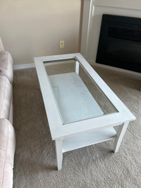 Coffee table with glass insert 