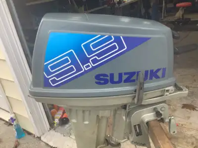 1986 Suzuki 9.9 hp outboard motor two stroke good condition has a new power pack head gasket car cle...