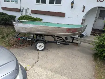 Comes with 2 new seats, brand new electric motor with brand new marine battery Foldable Trailer as w...