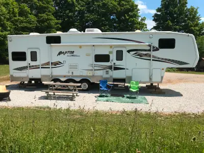 Good condition, clean, used Toy Hauler. ideal for hauling your motorcycle, dirt bikes or small vehic...