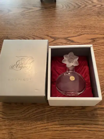 Crystal d argues pufume bottle and designer cap $10, View more