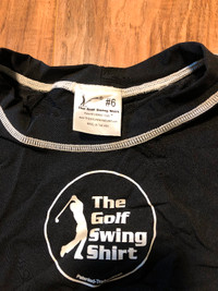 Golf swing shirt, practice aid. sz. Large
