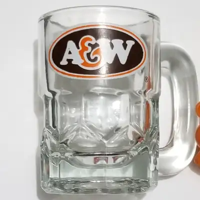 For sale one lot of vintage A&W memorabilia including one small glass Mug, one plastic Root Bear str...