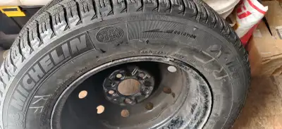 Used winter tires with rims from Toyota Sienna, Size 205/70R15 used only two winters, low mileage