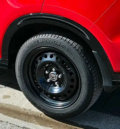 Honda/Acura snow tire pkg. Honda rims, Michelin X-Ice tires and center caps. 10,000km on the tires....