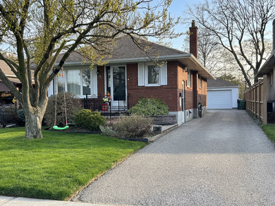 Bright and spacious basement apartment with private laundry and garage parking. Located near Victori...