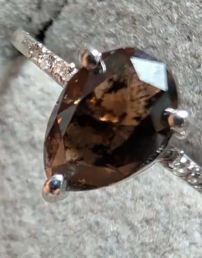 Handcrafted 14kt yellow gold custom engagement/anniversary ring featuring a pear cut champagne natur...