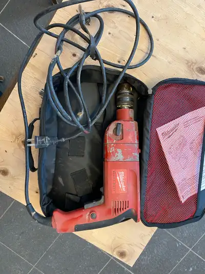 Milwaukee plug in hammer drill, View more