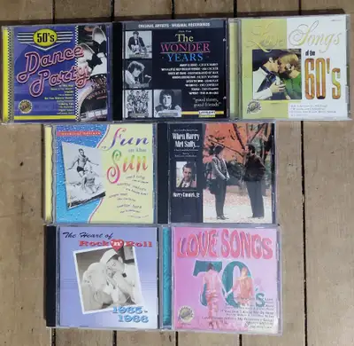 Looking for some songs from the past? This collection includes 5 compilation CDs along with a movie...