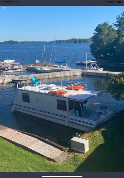Houseboat is Completely updated 42 ft X 12 ft Make Catamaran Cruiser . . Very spacious houseboat wit...