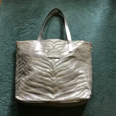 Large Michael Kors Est. 1981 Hand Bag. Measures 17.5” wide, 12.5”high, 4” deep. Very good condition....
