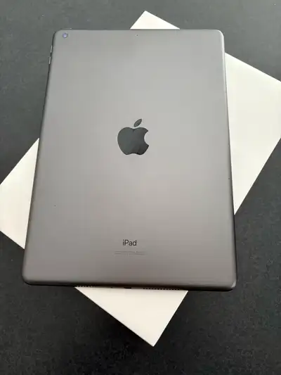 Apple iPad in excellent condition. Never dropped no scratches. Includes magnetic cover, charging cab...