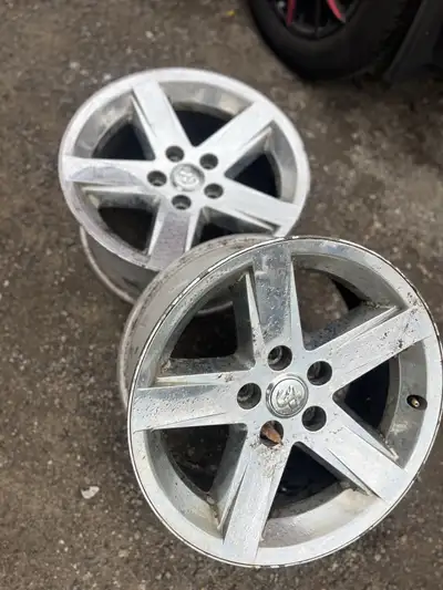 Stock wheels 20” 5x127 Include centre caps and TPMS Not perfect but great for a second set