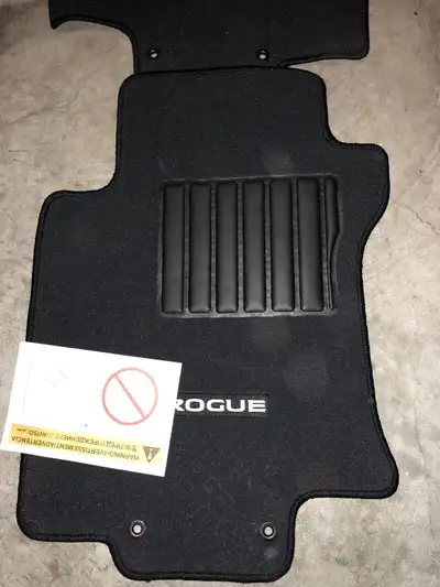 Selling brand new, never even opened Nissan Rogue floor mats. 4 total- 2 Front and 2 back. OEM. Came...