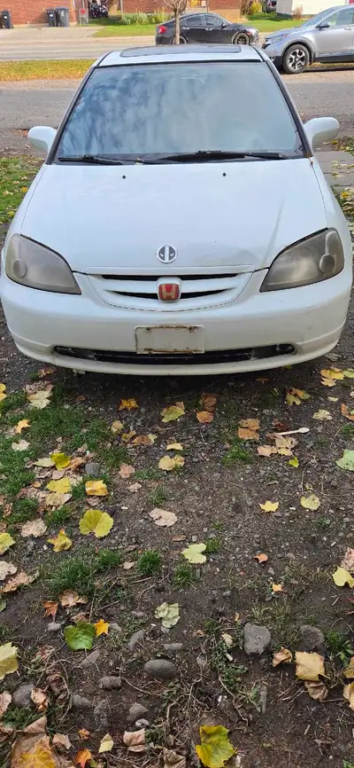 2 door honda civic 2002 Comes with snow tires Sub in the trunk Exhaust is new and routers, front str...