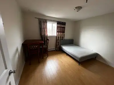 1 bedroom from 2 bedroom for rent Kitchen and barhroom are shared All included