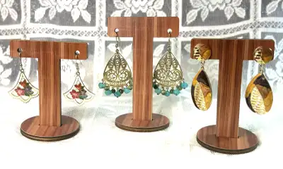 Vintage costume jewelry earring collection featuring approximately 24 pairs of earrings in a variety...
