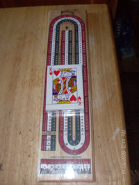cribbage board, & cards.  brand hew never opened. $20.