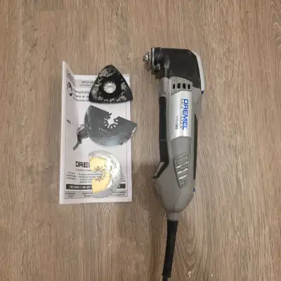 Dremel Multi-Max MM30 oscillating tool. It is in working conditions. it has signs of wear and tear b...