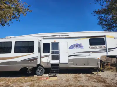 For Sale: 2011 Forest River Cedar Creek 40-foot trailer. Ideal for your hunt camp or family camping...