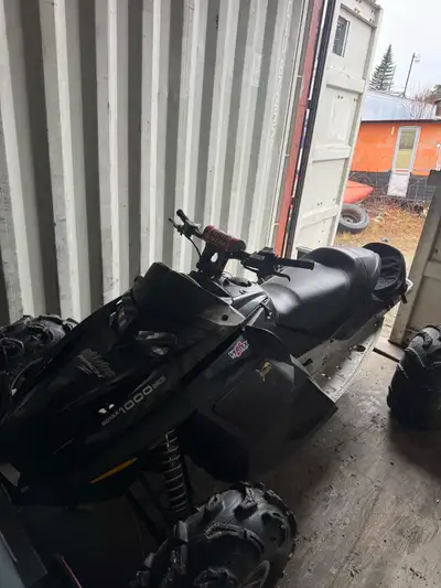 The sled was converted into a quad, runs and drives. Would need a chain tensioner built because the...