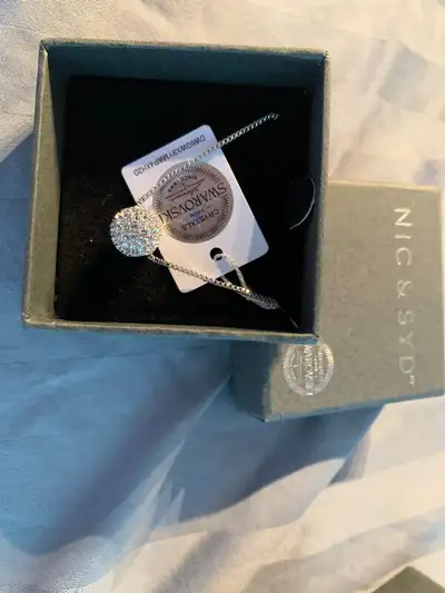 Brand new in box beautiful bobble necklace with Swarovski crystals. Pick up near Bathurst and Steele...