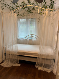 Canopy bed - twin size 