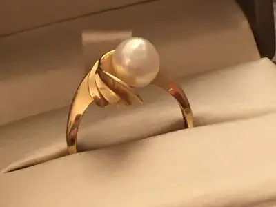 Yellow gold Real pearl ring 10K .size 6.. Total weight 3.8 grams, View more