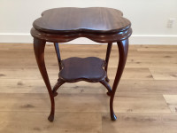 Beautiful, traditional, two-tier clover leaf wood table