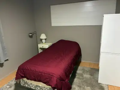 room for rent in a clean and quite home ,Utilities , wifi and laundry included