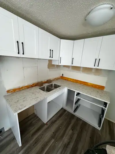 We supply and install quartz, granite, and marble This marble and quartz countertop setup is perfect...